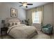 Comfortable bedroom with ceiling fan and neutral decor at 6002 Renaissance Ct, St Cloud, FL 34772