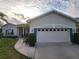 Inviting single Gathering home with well manicured lawn and two car garage at 6002 Renaissance Ct, St Cloud, FL 34772