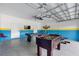 Game room in garage, pool table, foosball at 641 Pebble Beach Dr, Davenport, FL 33896