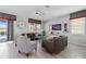 Spacious living room with comfortable seating and access to backyard at 641 Pebble Beach Dr, Davenport, FL 33896