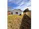 Large backyard with grassy area and wooden fence at 656 Oakford Way, Orlando, FL 32811