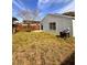 Spacious backyard, freshly cut grass and a tree at 656 Oakford Way, Orlando, FL 32811