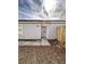 Newly renovated home with a gray front door and walkway at 656 Oakford Way, Orlando, FL 32811