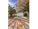 Newly renovated home with a spacious front yard and driveway at 656 Oakford Way, Orlando, FL 32811