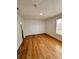Spacious living room featuring wood-look floors at 656 Oakford Way, Orlando, FL 32811