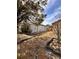 Gray house with a side yard and walkway at 656 Oakford Way, Orlando, FL 32811