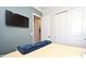 Bedroom with a TV and large closet at 7637 Sand Pierre Ct, Kissimmee, FL 34747