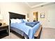 King-size bed in spacious Primary bedroom at 7637 Sand Pierre Ct, Kissimmee, FL 34747