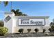 Entrance sign for Four Seasons at Orlando community at 7637 Sand Pierre Ct, Kissimmee, FL 34747
