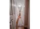 Bathroom featuring a tub/shower combo and wood-look tile flooring at 768 E Michigan St # 75, Orlando, FL 32806