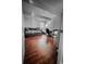 Bedroom features a seating area, desk, and wood-look tile flooring at 768 E Michigan St # 75, Orlando, FL 32806