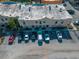 Overhead angle focusing on building exterior showing the parking and well-maintained facade at 768 E Michigan St # 75, Orlando, FL 32806