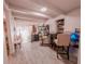 Open-concept living and dining area with wood-look tile flooring at 768 E Michigan St # 75, Orlando, FL 32806
