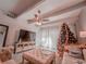 Cozy living room with a Christmas tree and natural light at 768 E Michigan St # 75, Orlando, FL 32806