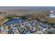 Aerial view showing home's location in a neighborhood near a pond at 836 Lake Evalyn Dr, Celebration, FL 34747