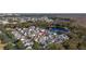 Aerial view showcasing home's location in a community near a pond at 836 Lake Evalyn Dr, Celebration, FL 34747