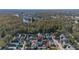 Aerial view of house and neighborhood, near a pond at 836 Lake Evalyn Dr, Celebration, FL 34747