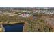 Aerial view showing home's location near a pond at 836 Lake Evalyn Dr, Celebration, FL 34747