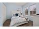 Cozy bedroom with a queen-size bed and plenty of closet space at 836 Lake Evalyn Dr, Celebration, FL 34747