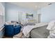 Comfortable bedroom with a king-size bed and relaxing sitting area at 836 Lake Evalyn Dr, Celebration, FL 34747