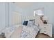 Inviting bedroom with a queen-size bed and ample closet space at 836 Lake Evalyn Dr, Celebration, FL 34747