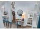 Light and airy entryway with a view into the kitchen and living room at 836 Lake Evalyn Dr, Celebration, FL 34747