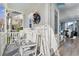 Front porch with rocking chairs and view into living room at 836 Lake Evalyn Dr, Celebration, FL 34747