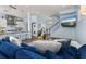 Open concept living space with kitchen, living room, and stairs at 836 Lake Evalyn Dr, Celebration, FL 34747