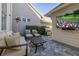 Outdoor patio with seating, grill, and TV at 836 Lake Evalyn Dr, Celebration, FL 34747