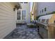 Patio with grill and seating area at 836 Lake Evalyn Dr, Celebration, FL 34747