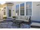 Backyard patio with seating and a view at 836 Lake Evalyn Dr, Celebration, FL 34747