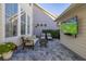 Relaxing outdoor patio with comfortable seating and large TV at 836 Lake Evalyn Dr, Celebration, FL 34747