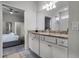 Vanity with granite countertop and modern fixtures at 8939 Zurich Ln, Kissimmee, FL 34747