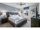 Spacious bedroom with king-size bed and ensuite bathroom at 8939 Zurich Ln, Kissimmee, FL 34747