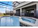 Enjoy your own private pool and spa with screened enclosure at 8939 Zurich Ln, Kissimmee, FL 34747