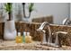 Close up of bathroom sink with granite countertop, brushed nickel faucet, and decorative toiletries at 8976 Azalea Sands Ln # 2604, Davenport, FL 33896