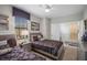 Well-lit bedroom features two beds with purple bedding and access to other rooms, creating inviting space at 8976 Azalea Sands Ln # 2604, Davenport, FL 33896