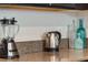 Kitchen countertop with stainless steel kettle and blender at 8976 Azalea Sands Ln # 2604, Davenport, FL 33896