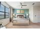 Main bedroom featuring a ceiling fan and window at 8976 Azalea Sands Ln # 2604, Davenport, FL 33896