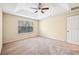 Bright bedroom with window and ceiling fan at 9439 Tawnyberry St, Orlando, FL 32832