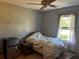 Bedroom with a ceiling fan and natural light at 974 Feather Dr, Deltona, FL 32725