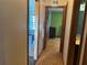 This hallway offers entrances to the various rooms in the house at 974 Feather Dr, Deltona, FL 32725