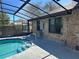 Swimming pool area featuring a brick house with an outdoor shower and a surfboard at 974 Feather Dr, Deltona, FL 32725