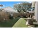 Small backyard with artificial turf and grill at 1001 11Th St, St Cloud, FL 34769