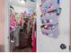 Well-organized closet with hanging rods and shelving units at 1001 11Th St, St Cloud, FL 34769