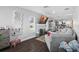 Spacious living room with fireplace, large TV, and comfy sectional sofa at 1001 11Th St, St Cloud, FL 34769