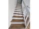 Modern stairway with wood treads and white risers at 10232 Turkey Lake Rd # 180, Orlando, FL 32819