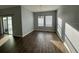 Bright dining area with hardwood floors and chandelier at 1075 Aerides Way, Davenport, FL 33837