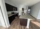 Modern kitchen with granite countertops and stainless steel appliances at 1075 Aerides Way, Davenport, FL 33837