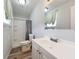 Clean bathroom with a single vanity, shower, and toilet at 1109 5Th Sw St, Winter Haven, FL 33880